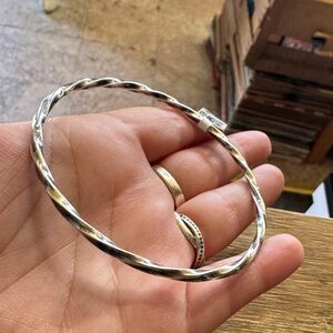 Consignment item..
Elegant Sterling Silver Twisted Bangle